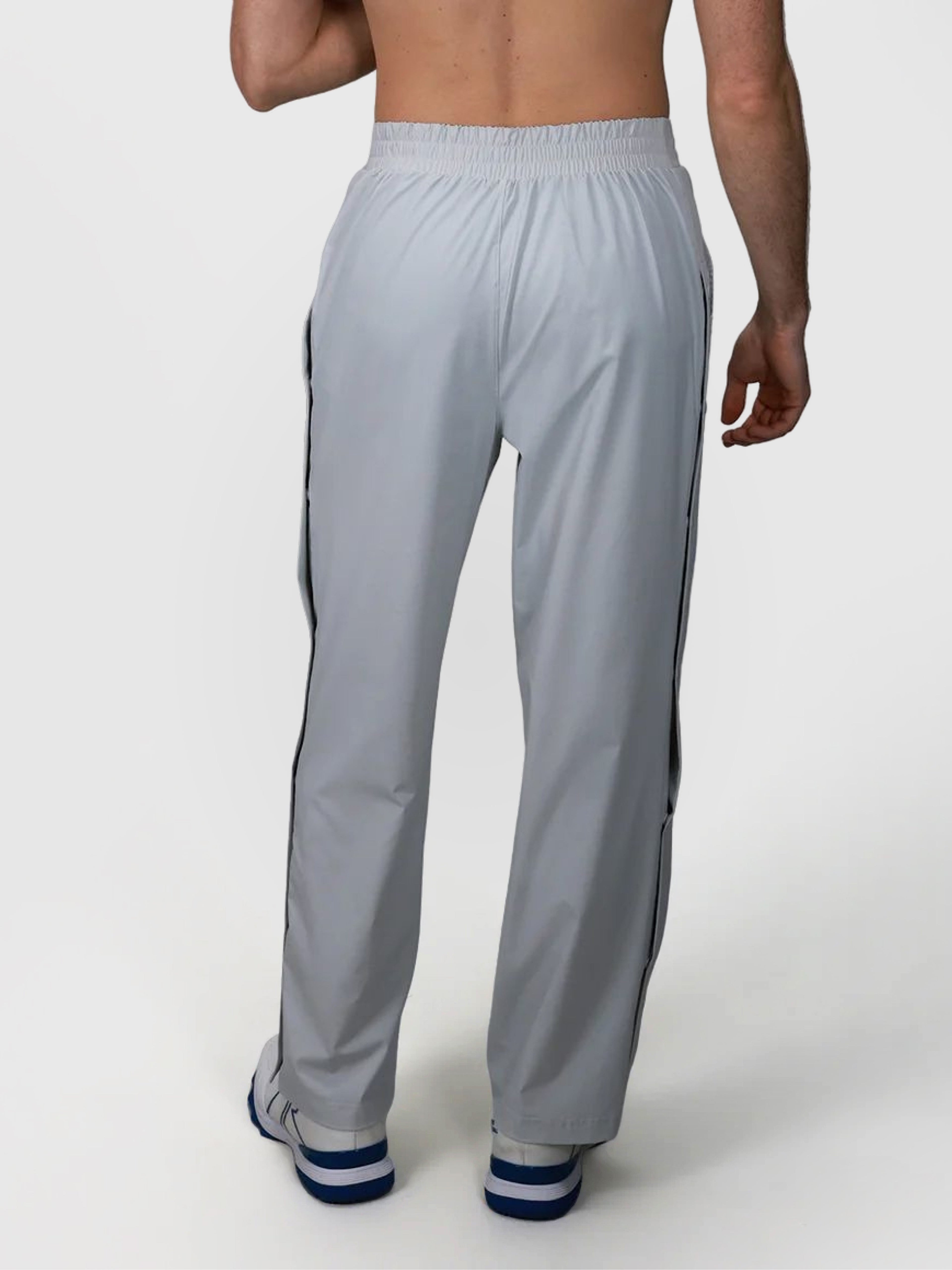 Rear view of gray J Sas Tear Away Pant by MUEV designed for pickleball and padel clothing with elastic waistband