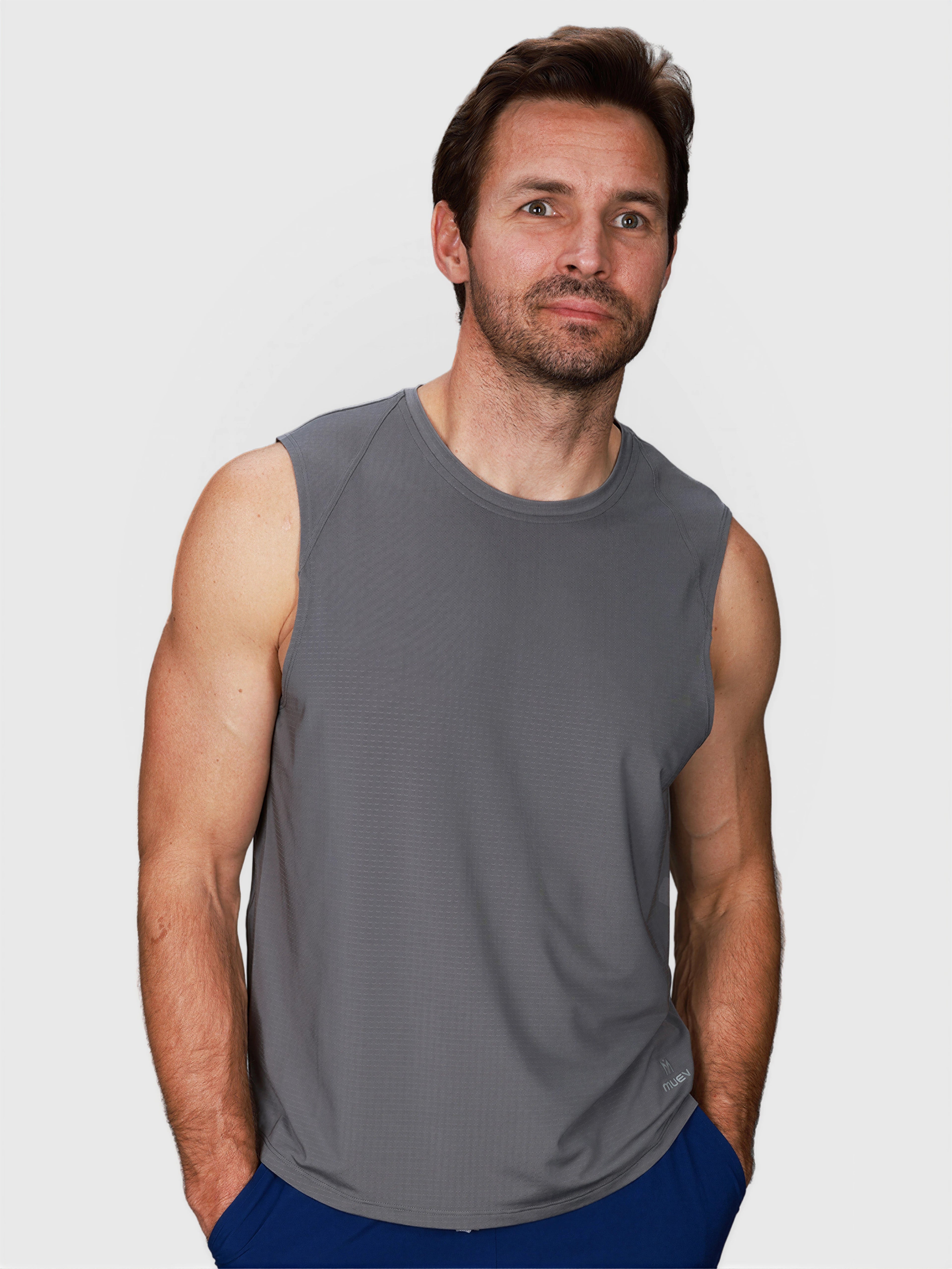 man wearing pewter gray Dink Tank by MUEV designed for padel and pickleball apparel