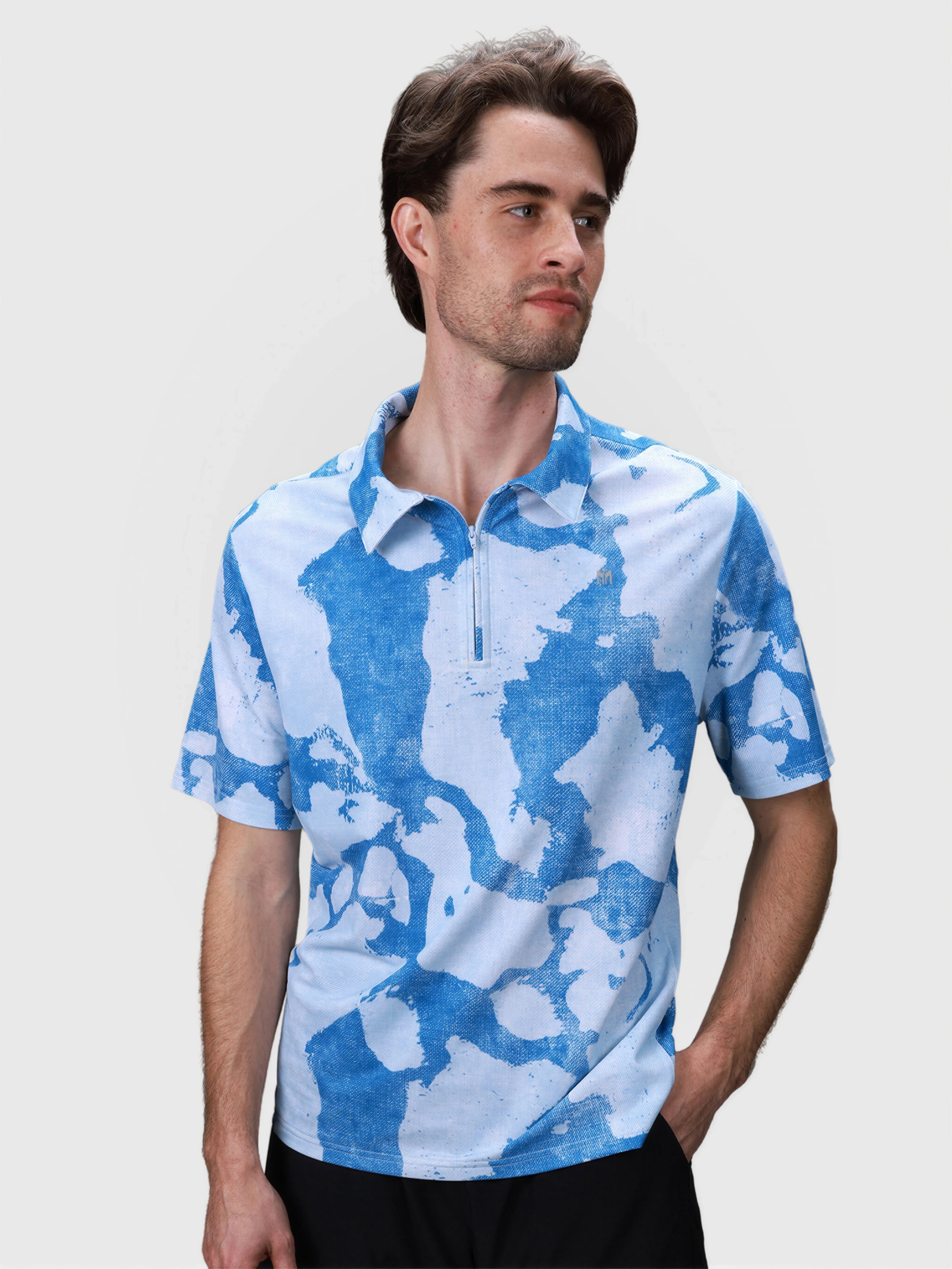 Man wearing Digital Camo Elevate Zip Polo by MUEV designed for breathable padel and pickleball apparel