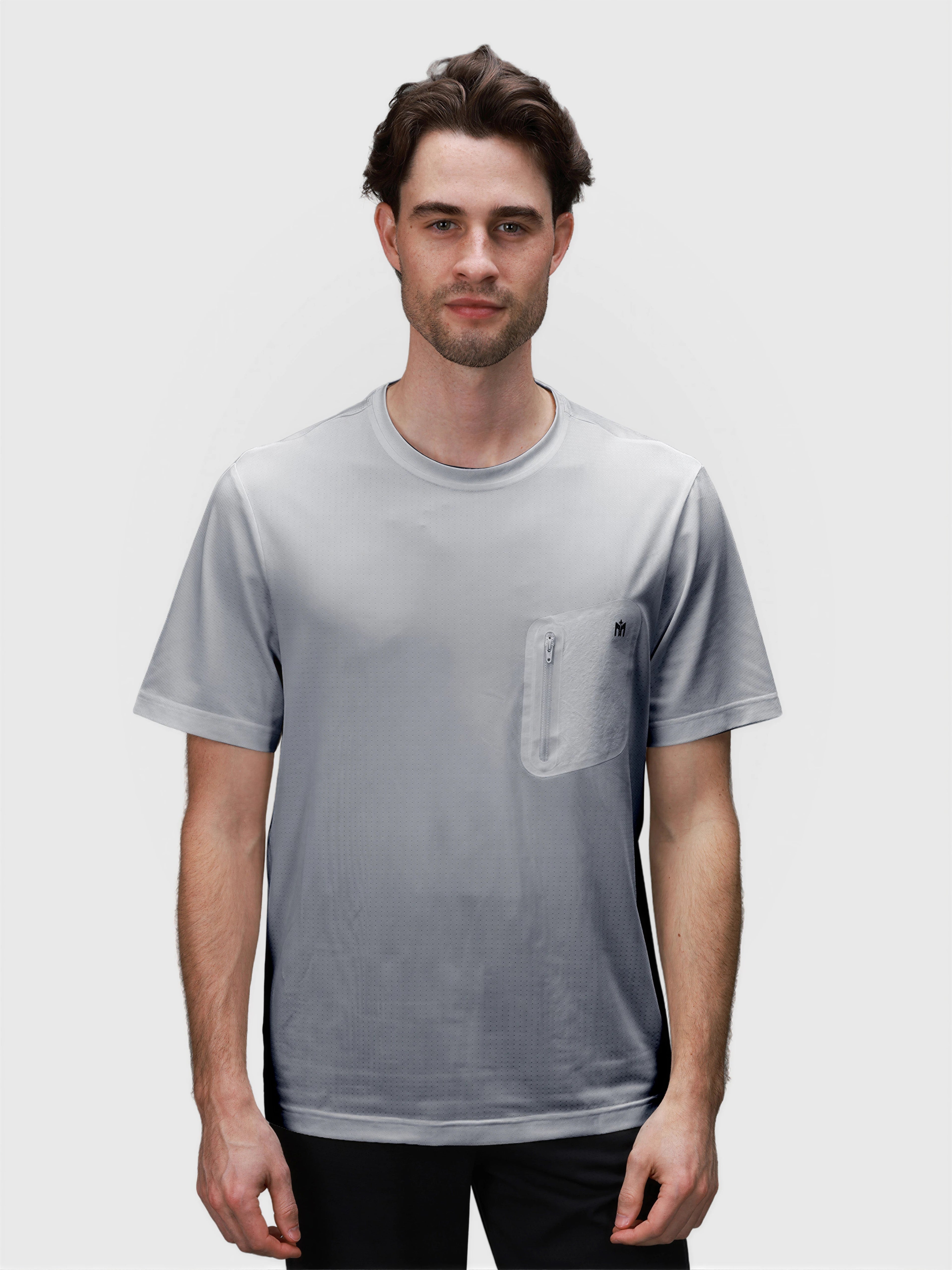 Man wearing gray Flex Bonded Pocket Tee by MUEV designed for comfortable pickleball and padel apparel